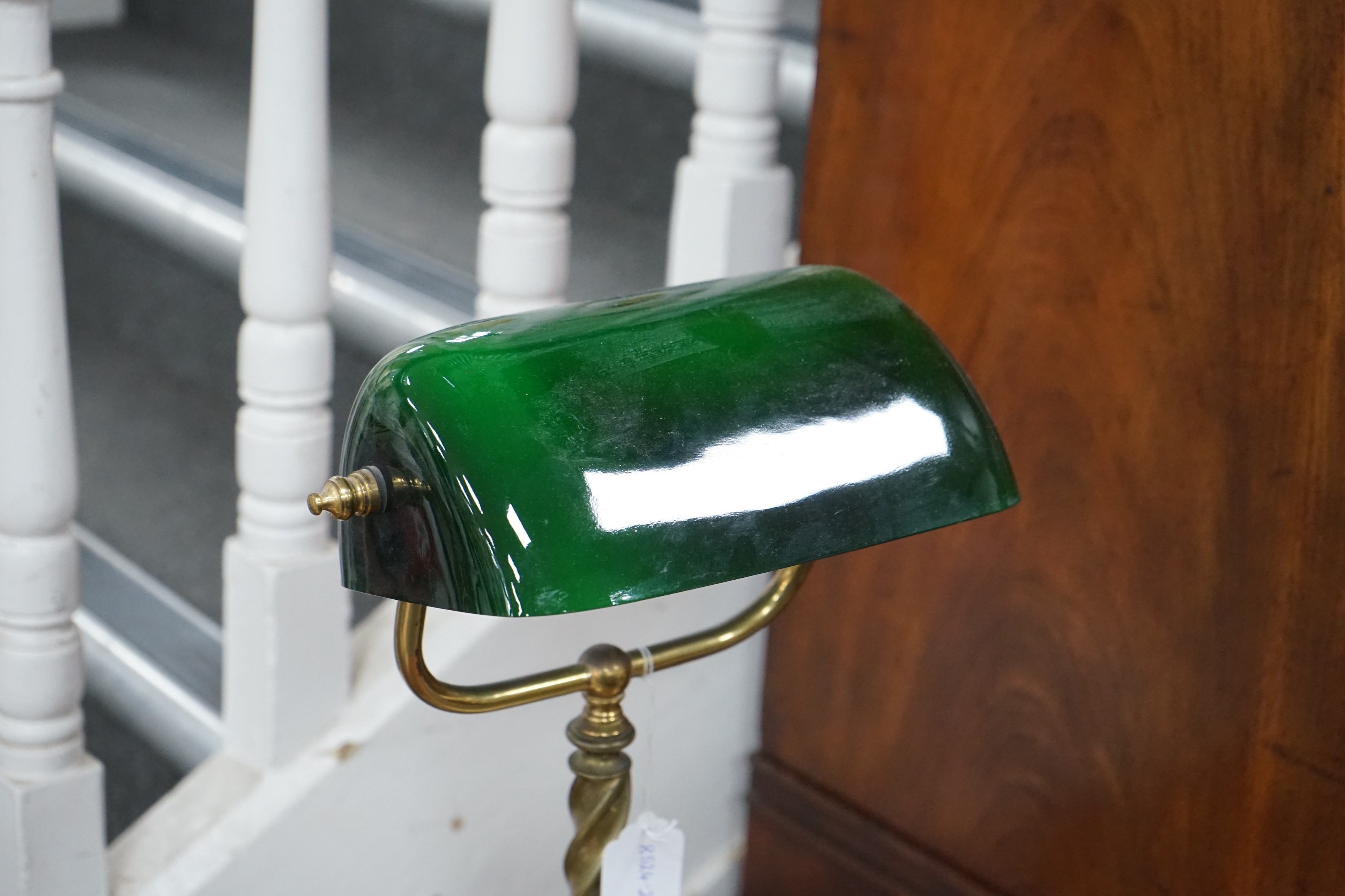 A brass twist stem student’s lamp, 41cm tall